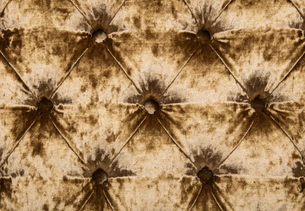 Textura de estofos de veludo tufado capitone dourado — Fotografia de Stock