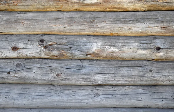 Old antique unpainted wooden logs wall texture — Stock Photo, Image