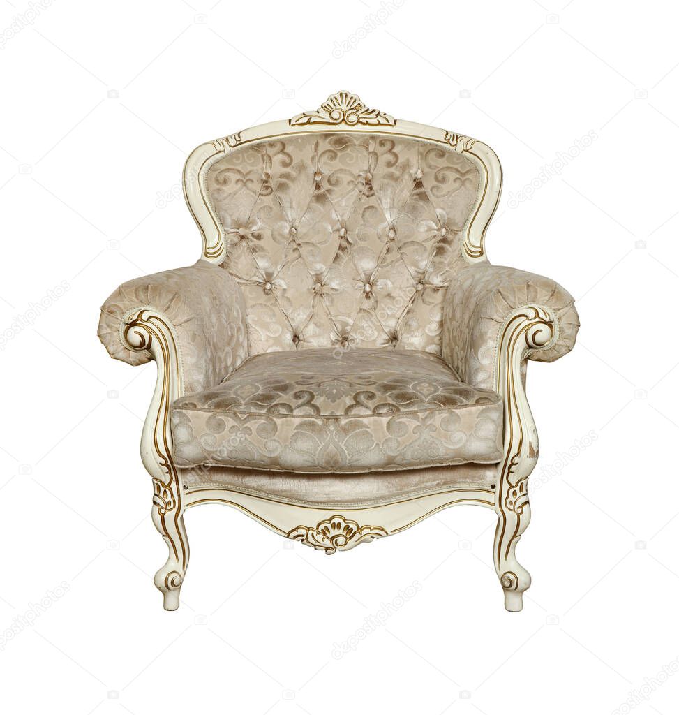 Beige tufted retro Chesterfield style armchair isolated over white background, low angle, front view