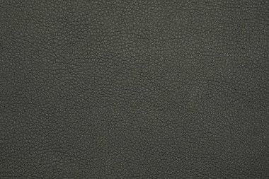 Siyah doğal deri taneciklerinin arka plan dokusunu kapat.