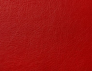 Kırmızı doğal deri taneciklerinin arka plan dokusunu kapat.