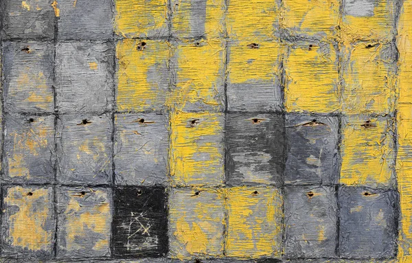 抽象的な不均一なグランジ黄色と灰色の背景を閉じます古い風化から剥離塗料チェッカー木製合板表面 — ストック写真