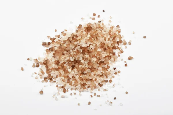 Handful of smoked Danish salt isolated on white — ストック写真