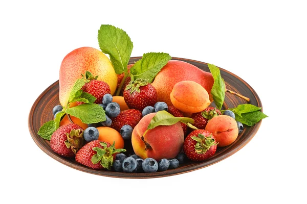 Fruits and berries mix in ceramic plate isolated on white — Stock Photo, Image