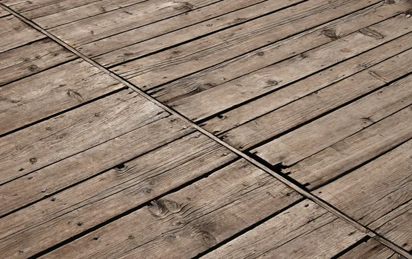 Vintage wooden panel with diagonal planks and gaps — Stock Photo, Image