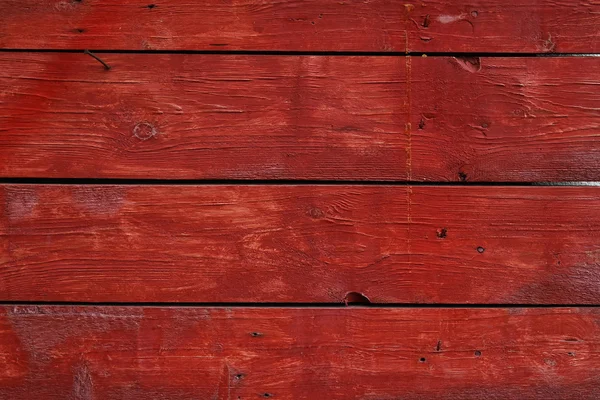 Rot lackierte Holzplatte mit horizontalen Planken — Stockfoto