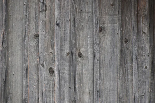 Cerca de madeira vintage com pranchas verticais e lacunas — Fotografia de Stock