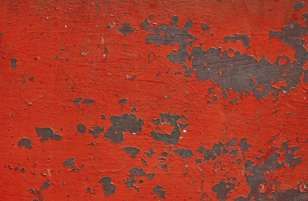 Rojo teñido oxidado superficie de metal pintado con escamas — Foto de Stock