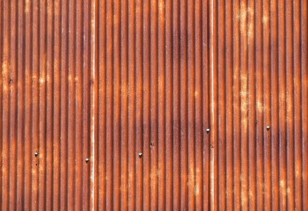 Old bright rust corroded metal goffered surface — Stock Photo, Image