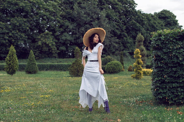 Walk with a girl in the summer garden