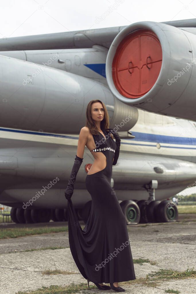 Brunette woman at the airfield