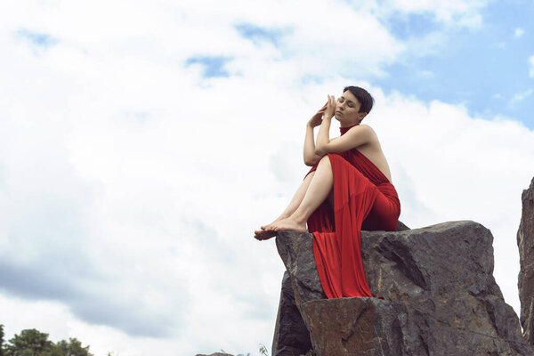 Girl with short hair in the park