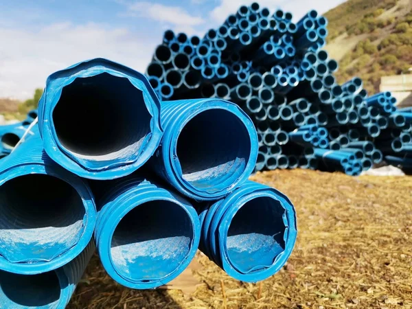 Blue pipes. Blue plastic pipes.