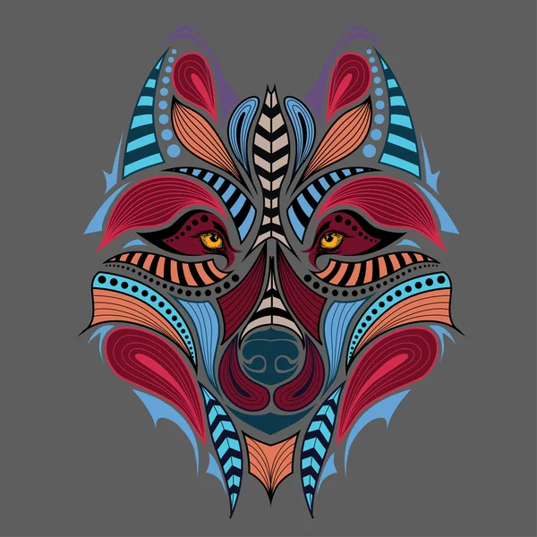 Patterned colored head of the wolf. African / indian / totem / tattoo design. It may be used for design of a t-shirt, bag, postcard and poster. — Stock Vector