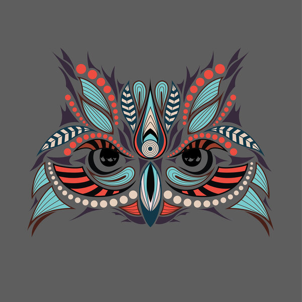 Patterned colored head of the owl. African / indian / totem / tattoo design. It may be used for design of a t-shirt, bag, postcard and poster.