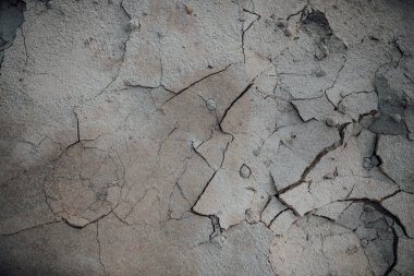 Çatlamış kuru kahverengi toprak dokusu soyut arkaplan olarak