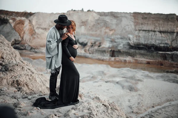 African American Man Hugging Pregnant Woman Black Dress Couple Posing — Stock Photo, Image