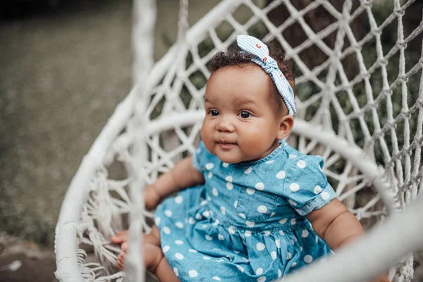 Outdoor Portrait Cute Little Girl Blue Dress Sitting Wicker Chair — Stock Photo, Image