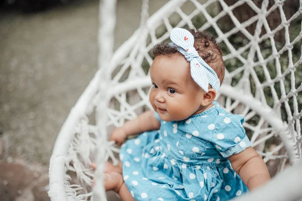 Outdoor Portrait Cute Little Girl Blue Dress Sitting Wicker Chair — Stock Photo, Image