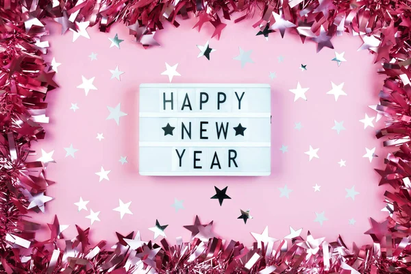 Pink tinsel frame border decor with confetti and Happy New Year Board letter text — Stock Photo, Image