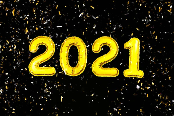 2021 Happy New Year numbers text, confetti on black background. Christmas party greeting decor — Stock Photo, Image