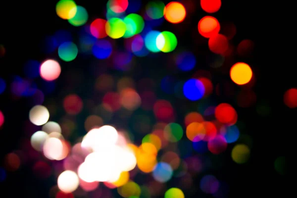 Christmas Tree Garland Light Colorful Bokeh Blurry Decor Black Background — Stock Photo, Image