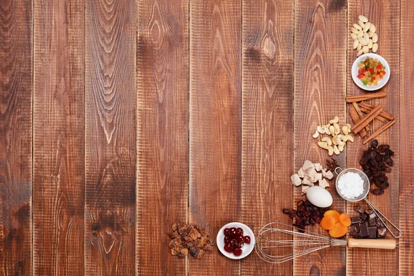 Ingredients cakes on a wooden background. — Stock Photo, Image