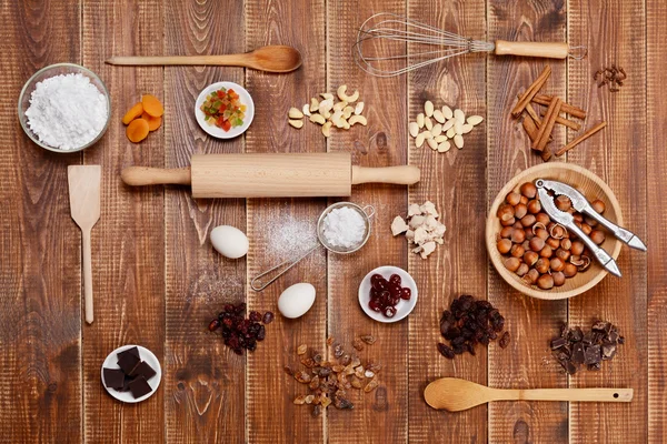 Ingredients cakes on a wooden background. — Stock Photo, Image
