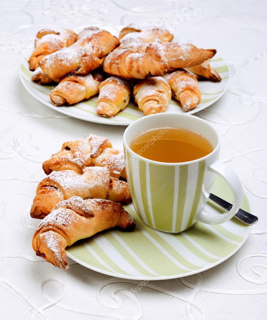 Croissants with cup of tea.