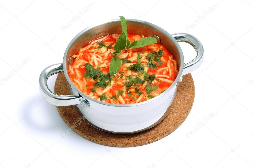Tomato soup with noodles in the pot