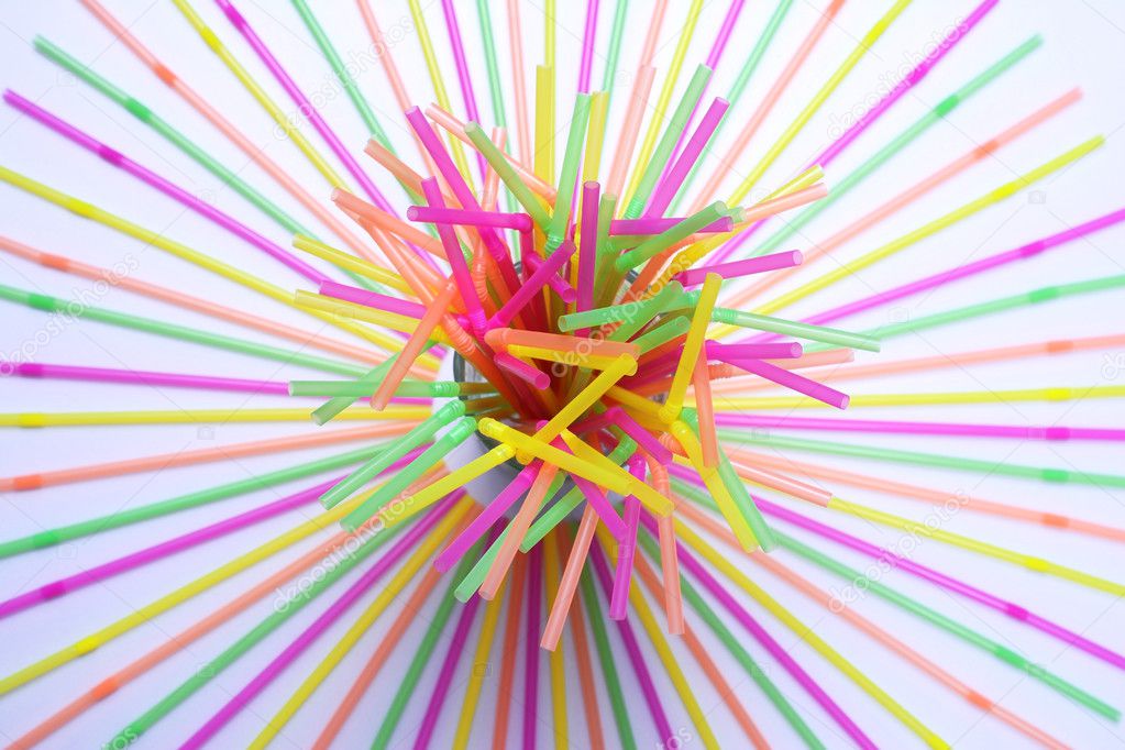 Circle aligned with drinking straws . Isolated background.