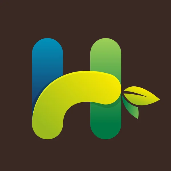H lettera logo con foglie verdi . — Vettoriale Stock