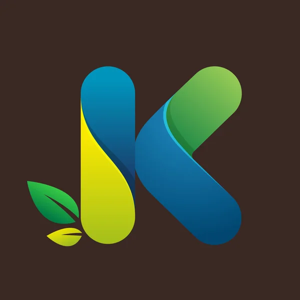 K letter logo with green leaves. — Stock Vector