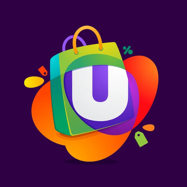 U letter with shopping bag icon and Sale tag. — Stock Vector