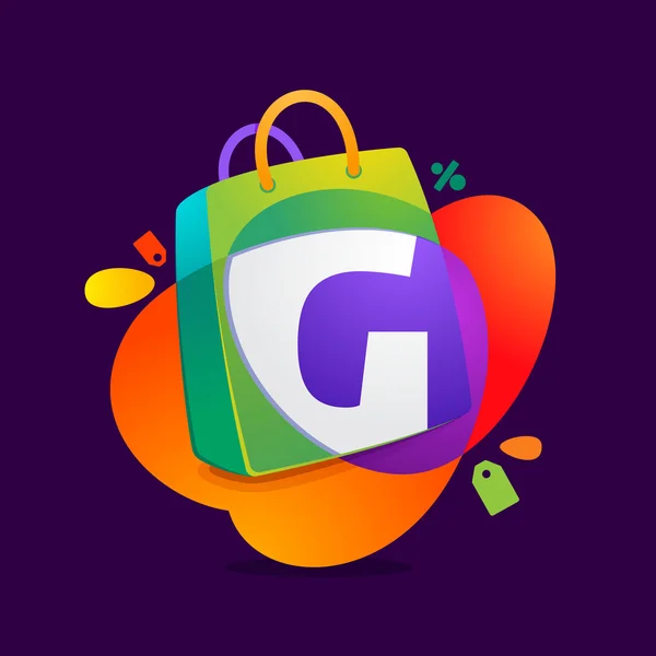 Carta G con icono de bolsa de compras y etiqueta de venta . — Vector de stock