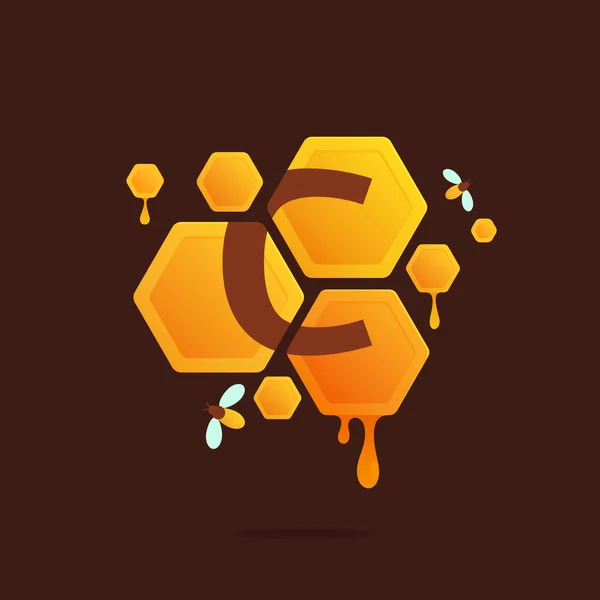 Letter C logo in Honeycomb with flowing honey. — Stock Vector