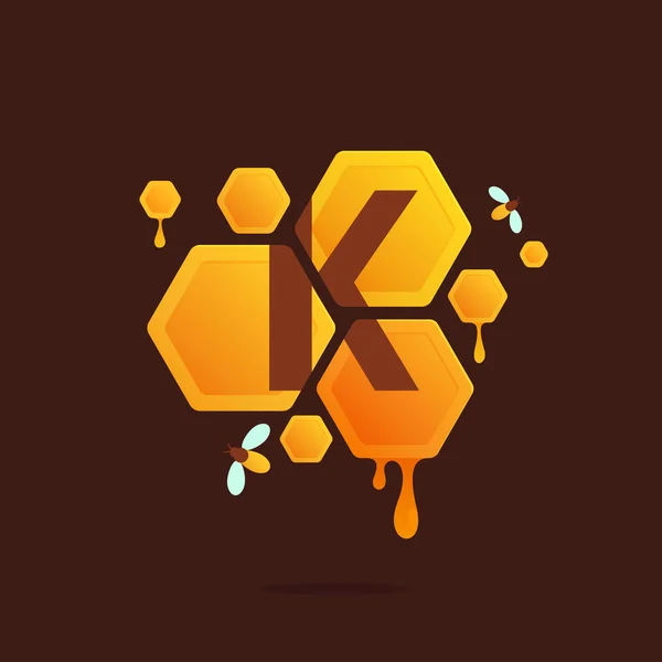Letter K logo in Honeycomb with flowing honey. — Stock Vector