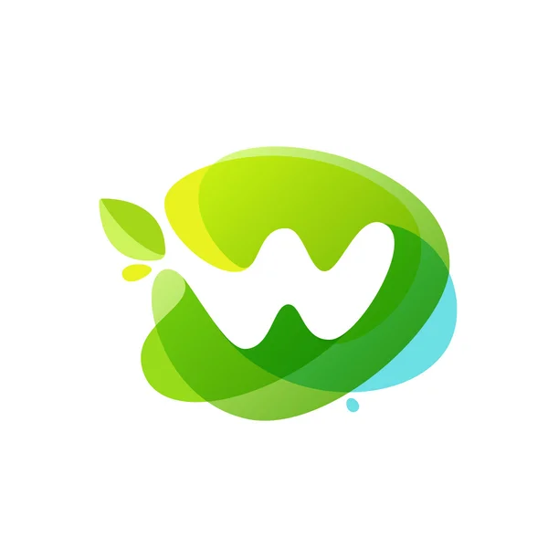 Letter W logo at green watercolor splash background. — Stock Vector