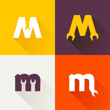 M harfi ile İngiliz anahtarı logo koymak.