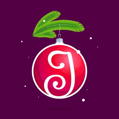 J harfi ile Noel kırmızı top ve çam dalları.