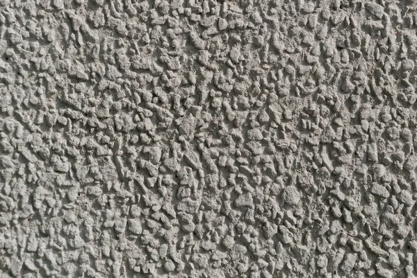Eski gri beton duvarın arka planı.