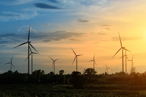 Wind turbines, wind farms silhouette at sunset in Thailand