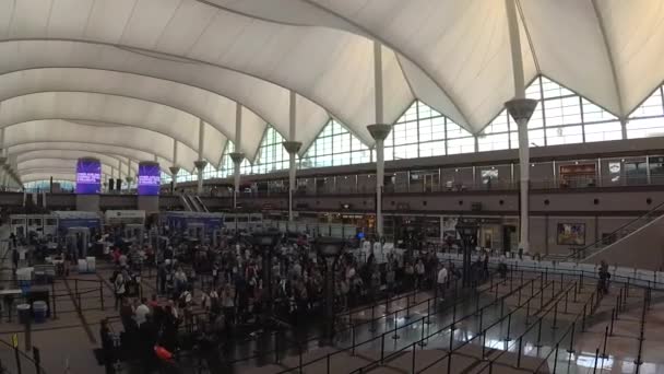 Walking through an airport between terminals — Stock Video