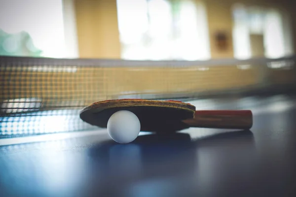 Table tennis racket and ball