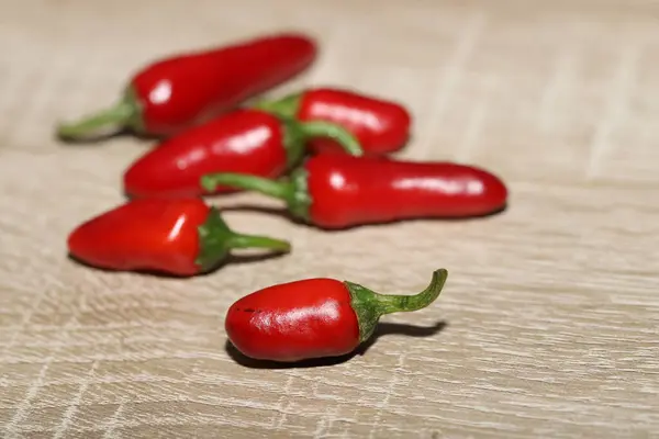 Red Hot Chili Peppers Wooden Background — Stock Photo, Image