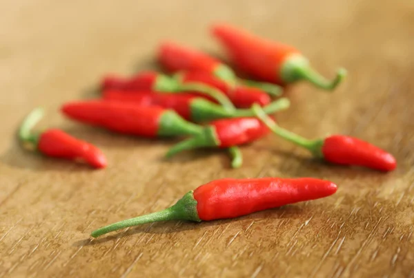 Red Hot Chili Peppers Wooden Table — Stock Photo, Image