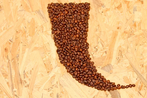 Roasted coffee beans on a wooden background, — Stock Photo, Image