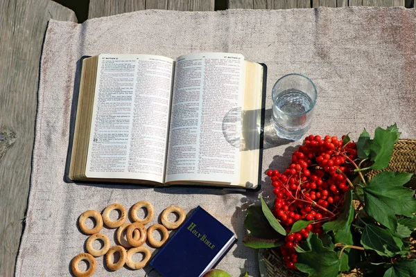 open book Bible, the food on the river