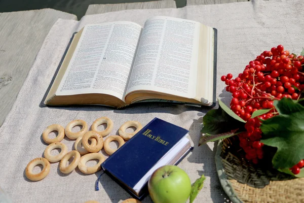 open book Bible, the food on the river