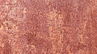 Paslı çelikten pürüzsüz bir yüzey. Arkaplan yapmak için uygun kaba, kahverengi bir dokusu var. Ve eski duvar kağıtlarının mesaj yazmak için bir alanı var..